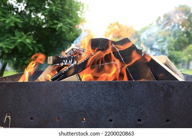 Burning Firewood In Grill In Backyard On Picnic