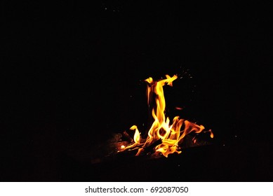 Burning flame in the dark