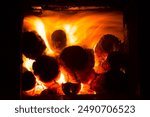 burning furnace, wood in the furnace, burning wood, inside of the furnace, lit fire, high temperature, hot, red, orange, yellow, flames, fireplace, firewood, logs