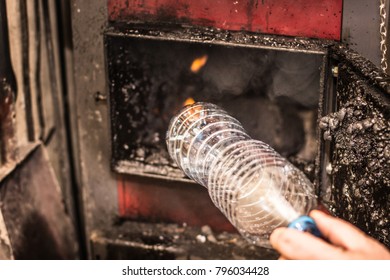 Burning Garbage In A Coal Furnace, Plastic Bottle. Problems With Smog.