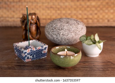 Burning Incense, Stone, Fresh Plant Leaves, Candlelight. Yoga, Meditation Equipment. 