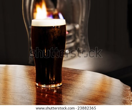 Burning Irish black beer. Shot inside a Dublin pub.