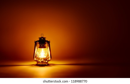 Burning kerosene lamp background, concept lighting