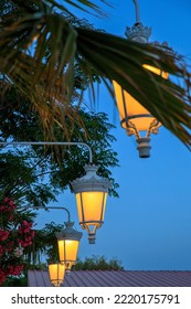 Burning Lanterns In A Restaurant On The Greek Island Karpathos By Night