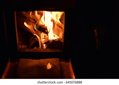 Burning Logs In Finnish Sauna Stove.