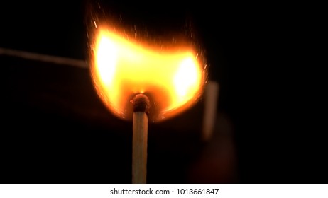 Burning match, bright firelight black isolated background - Powered by Shutterstock