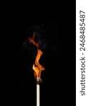 burning matches on black background