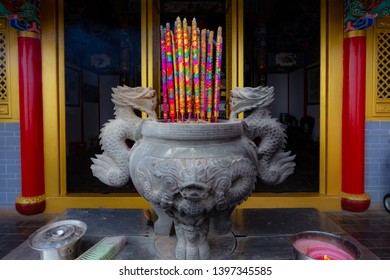 Burning Praying With Joss Stick At Buddhist Temple Xishan Forest Park, Kunming, Yunnan China.