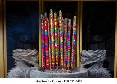 Burning Praying With Joss Stick At Buddhist Temple Xishan Forest Park, Kunming, Yunnan China.