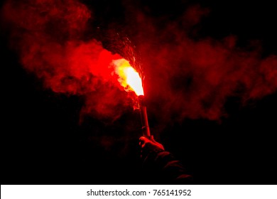 Burning Red Flare In Dramatic Smoke Scenery