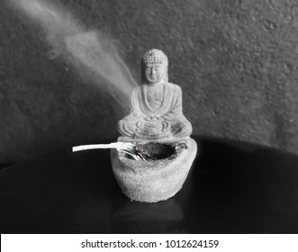 Burning sage and meditated Buddha.