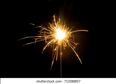 Burning Sparkler Isolated On Black Background