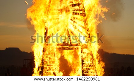 Burning structure during sunset in the Karoo desert near Cape Town, South Africa.