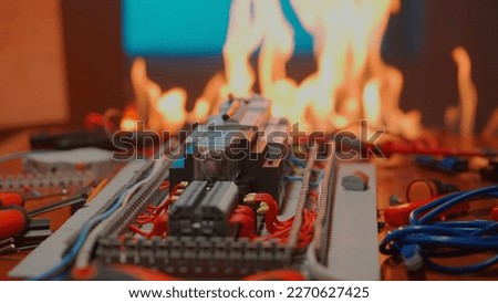 Burning switchboard from overload or short circuit. Circuit breakers on fire from overheating due to poor connection. Breakdown in electrical equipment in the workshop. Electric power supply.