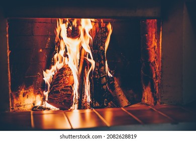 Burning Wood In Open Fire Place