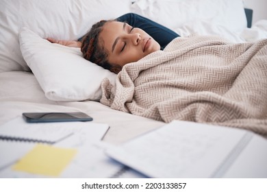 Burnout, Sleeping And Tired Scholarship Or University Student In Bed After Study Or Research With Smartphone. Sleep Or Fatigue Woman While Learning For Test Or Exam With Notebook In Bedroom At Night