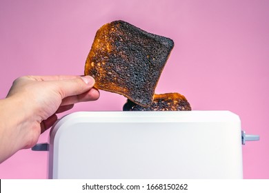 Burnt Bread Toast In The Toaster