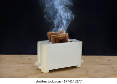 Burnt Bread Toast In The Toaster