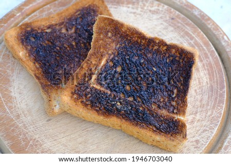 Burnt bread from the toaster.Burning produces carcinogens.