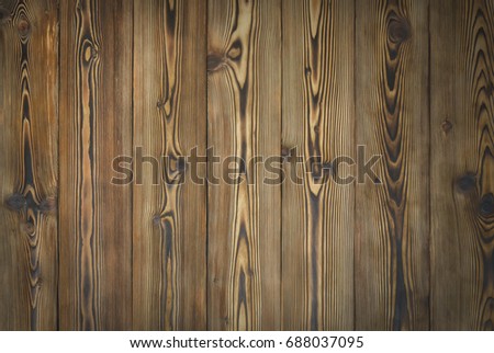 Burnt brown not painted wooden board texture background