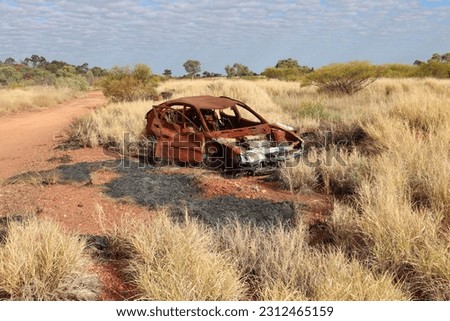Burnt car.
Abandoned
Fire
Outback
Stolen