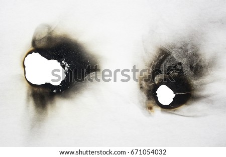 Burnt cardboard on a white background