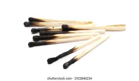 Burnt fire matches pile, burned matchsticks group isolated on white background