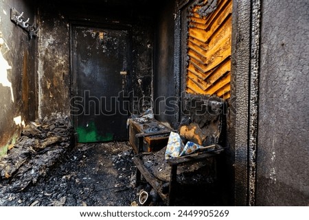 Burnt house interior. Consequences of fire.