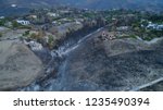 Burnt Landscape Of Woolsey Malibu Fire and Malibu State Creek park region with Fire Retardant visible