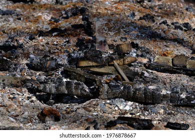 Burnt Out Small Garden Shed With Ash.