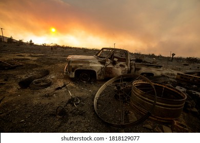 A Burnt Vehicle Is Seen During The Bobcat Fire Burning In Juniper Hills, California, Saturday, Sept. 19, 2020.