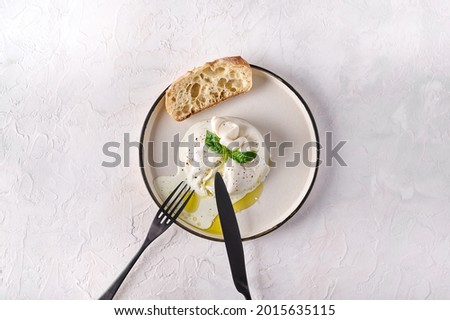 Similar – Tomatencremesuppe in roter Schüssel auf Grunge-Hintergrund