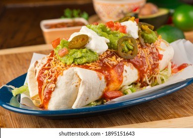 Burritos or tacos. Mexican or Tex-Mex food favorite. Seasoned meat, refried or black beans, Mexican rice, cheese, fried vegetables wrapped in homemade tortillas and served with salsa. Takeout favorite