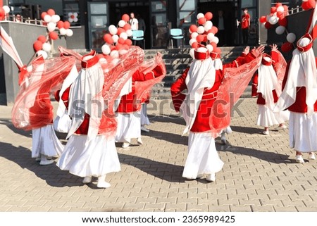  Bursa Turket - October 29 2022 : National Sovereignty and Children Day festival.Turkish children dancing in red and white traditional costumes. High quality photo