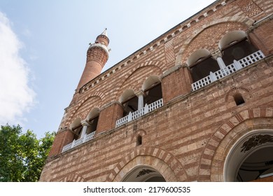 Bursa, Turkey - July 9, 2022: Historical Sultan Murat I Mosque in Cekirge, Bursa. Old arched structure and minaret.