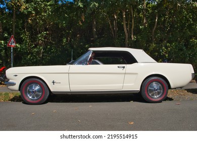 Burscheid, NRW, Germany, 08-21-2022 - Ford Mustang Cabriolet From The Sixties, Vintage Car, Side View