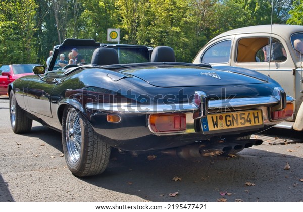 Burscheid, NRW, Germany, 08-21-2022-
Jaguar e V12, cabriolet , vintage car, rear angled
view