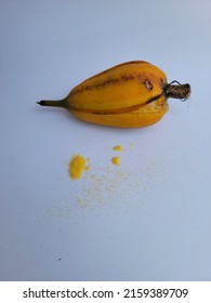 A Burst Seed Pod Of Cymbidium Orchid On White Background. Seeds Will Be Carried Off By The Wind As Pollination. Those Small Dots On The Outside Of The Pod Are Tiny Seeds.