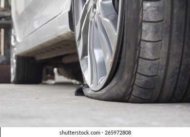 burst tire - Shutterstock ID 265972808
