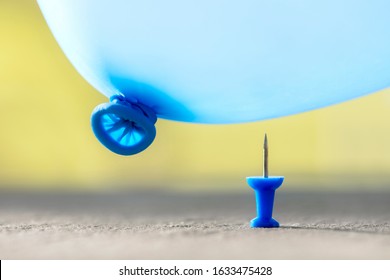 Burst your bubble thumb tack and balloon about to pop background