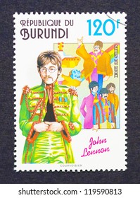 BURUNDI - CIRCA 1994: a postage stamp printed in Burundi showing an image of John Lennon and The Beatles, circa 1994.