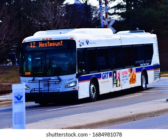 Bus 12 Westmount From Grand River Transit, GRT Passing A Railway Near University Of Waterloo In Waterloo Region, Ontario, Canada March 25, 2020. 