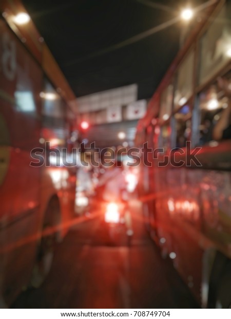 The bus between\
the two buses and the road.