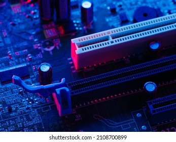 Bus with a connector on the board. A processor socket is a slot on a motherboard designed to house a processor. Parts of a personal computer, laptop. Neon lighting.