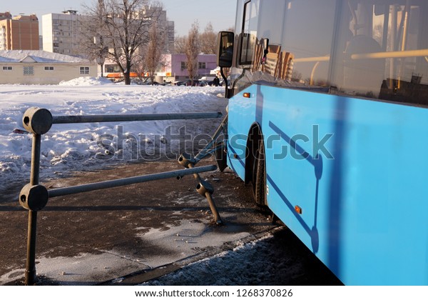 The bus crashed into\
the pavement fence and broke it. The concept of careless and\
inattentive driving.