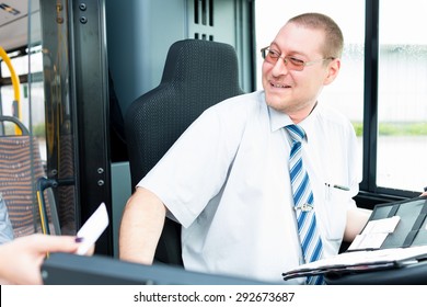 Bus Driver Selling Tickets In Bus From Drivers Seat