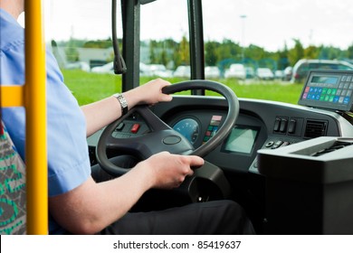 Bus Driver Sitting In His Bus On Tour