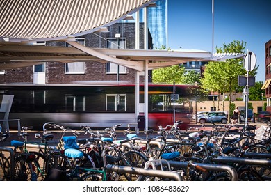 A Bus Driving Away From A Bus Station In Waalwijk, The Netherlands.