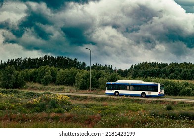 Bus Driving Through The City Outskirts