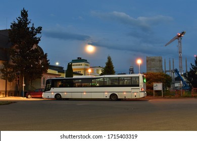 Bus For Factory Workeres In Front Of Factory. Night Shift.